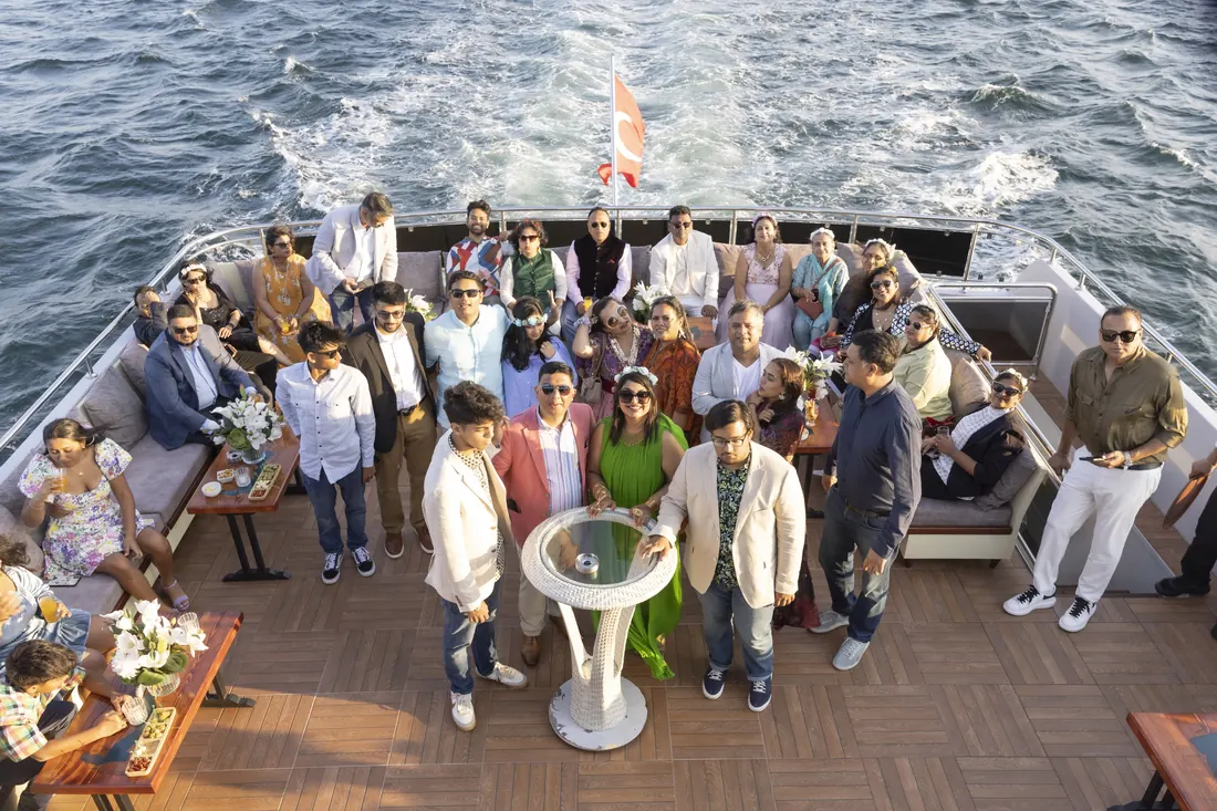 Anniversary group on the aft deck of a yacht