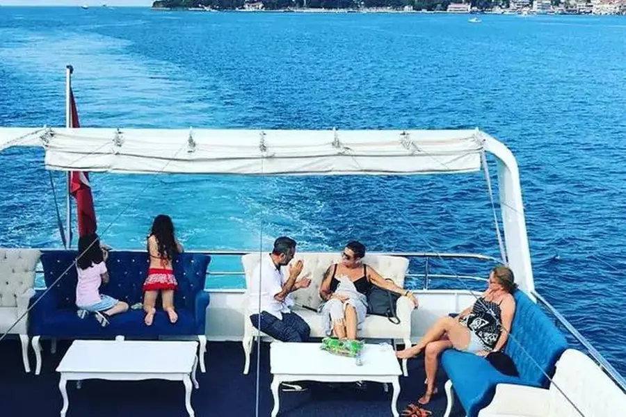 Guests on a boat deck on the way to the Black Sea