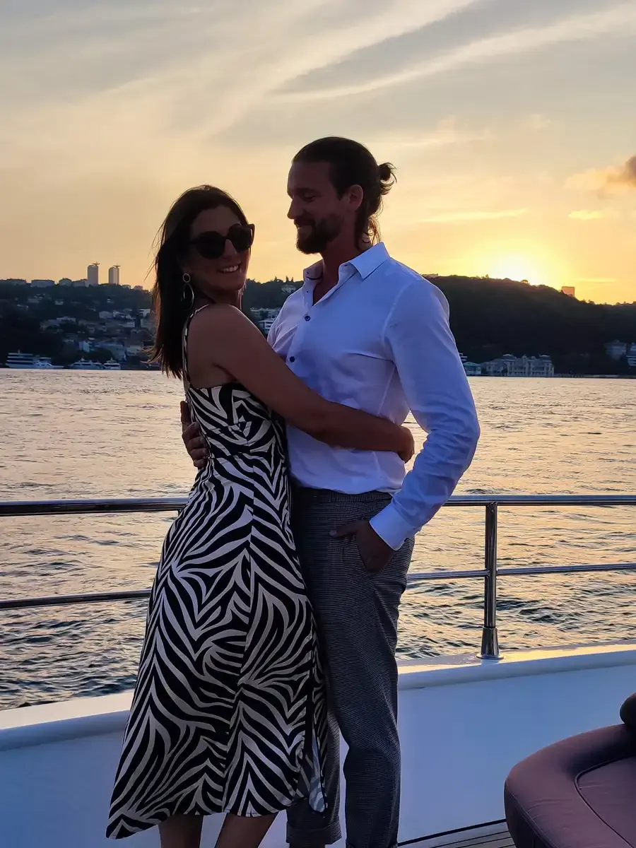 Couple on deck during a Bosphorus mansions cruise