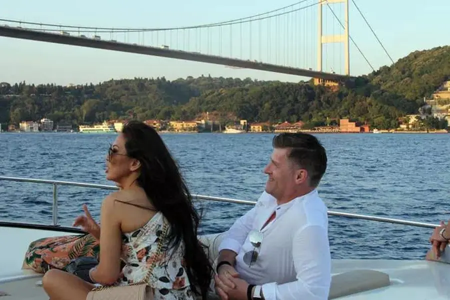 Couple on the deck of the sightseeing cruise