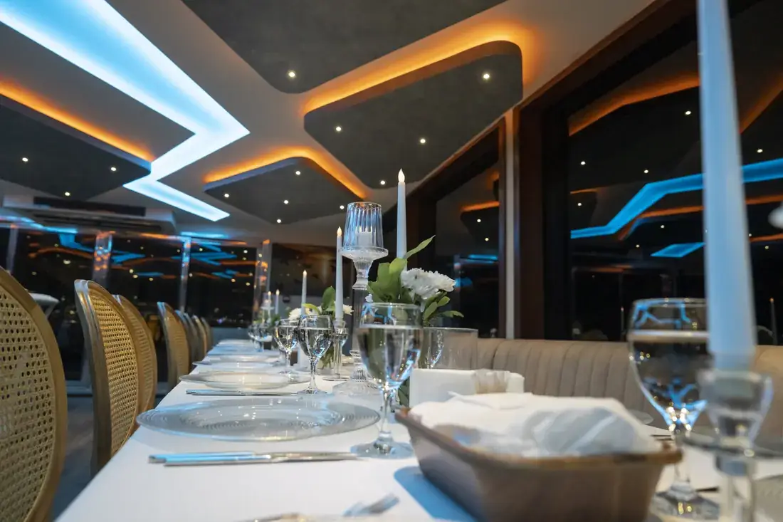 Gala table with glassware in the saloon of a yacht