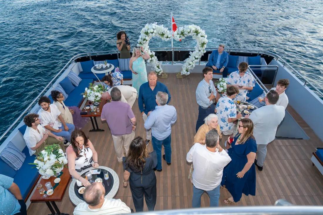 Engagement guests gathered on a yacht deck