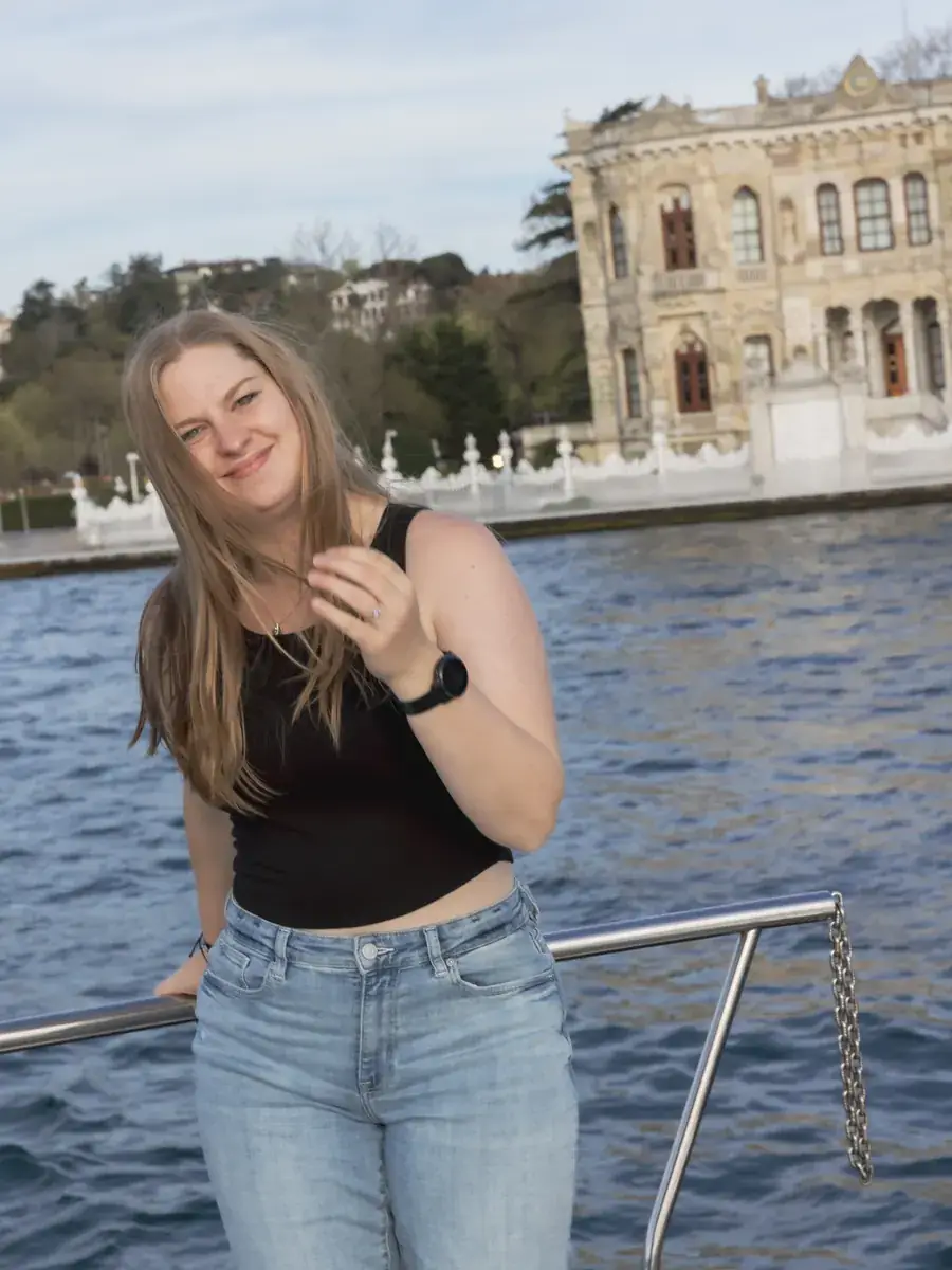 Graduate on a yacht near a Bosphorus palace