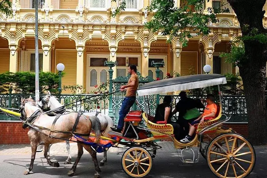 Horse carriage in front of a historic mansion on Büyükada