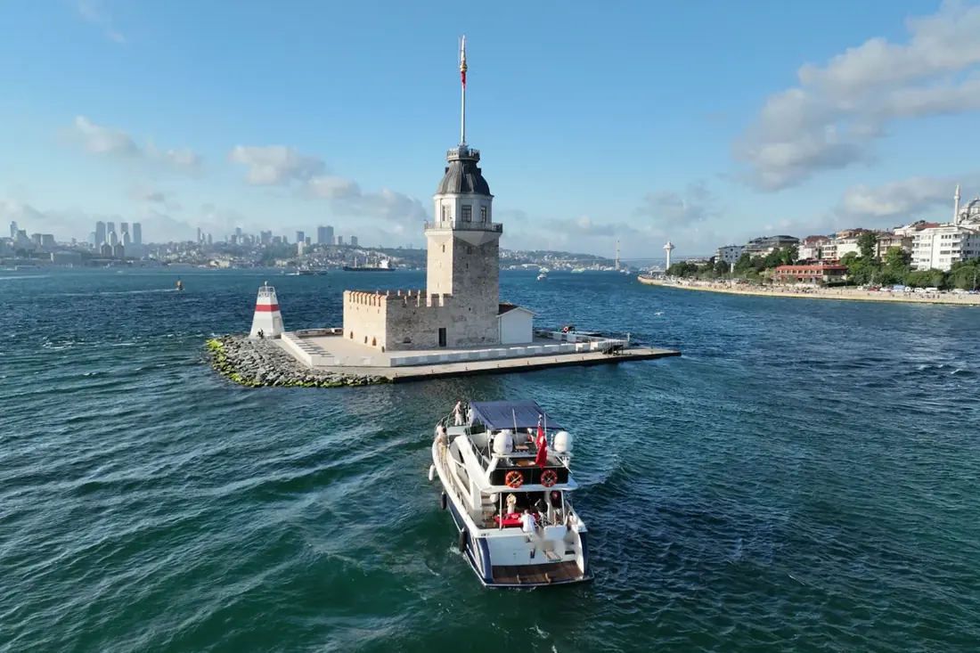 Azure yacht by the Maiden's Tower
