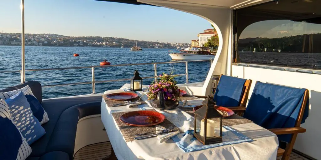 Aft deck table set for dinner on Blue Horizon