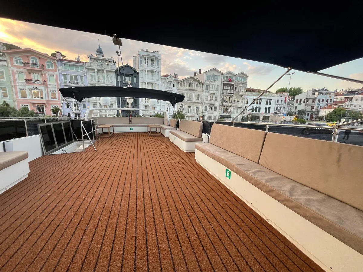 Flybridge with Bosphorus mansions behind on Blue Wave