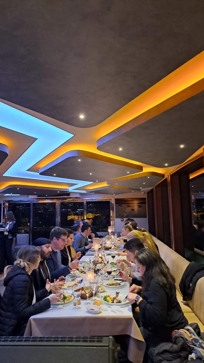Guests at dinner in the saloon of Crescent Star