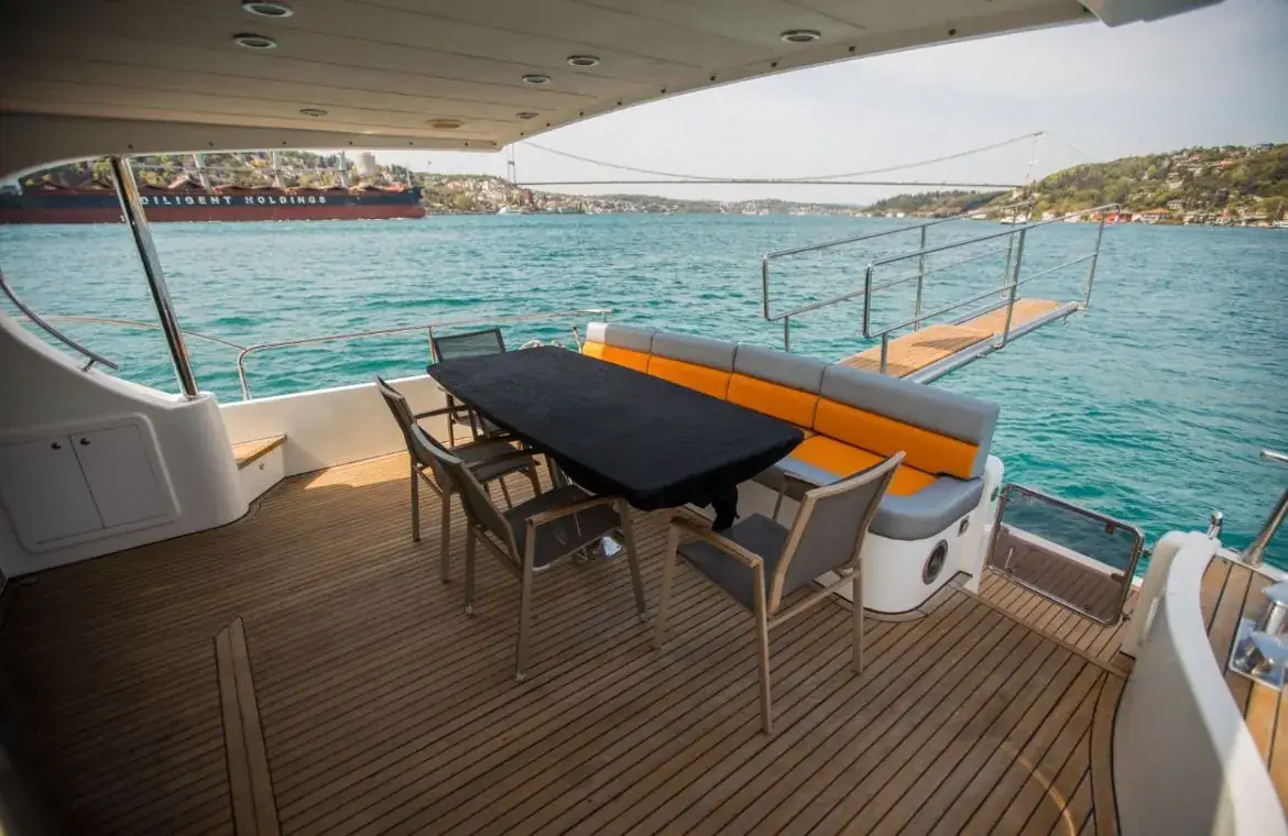 Aft deck with table on the Riviera yacht