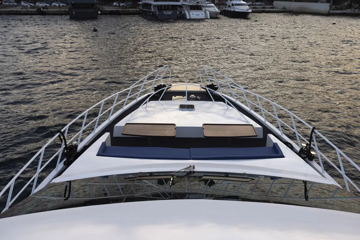 Bow of the White Istanbul yacht at dusk