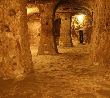 Round rolling stone door used to seal a passage in Derinkuyu Underground City