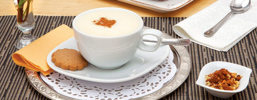 Cup of hot sahlep sprinkled with cinnamon