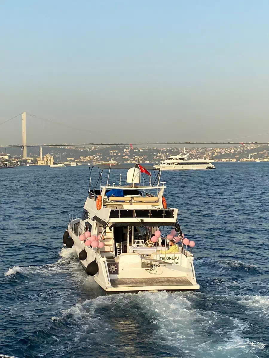 Private yacht on the Bosphorus in Istanbul set up for an evening dinner