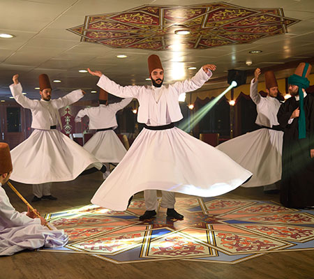 Folk dancers in traditional costume at a Turkish night on the Bosphorus