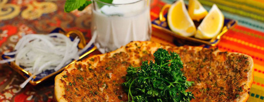 Lahmacun, the thin spiced flatbread, as served in Kadikoy, Istanbul