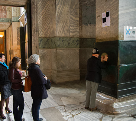 The weeping column with its bronze casing and thumb hole inside Hagia Sophia