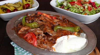 Iskender kebab with tomato sauce, butter and yoghurt