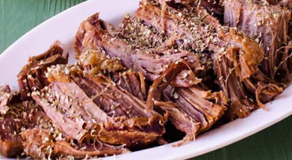 Kuzu tandır, slow-roasted lamb served with rice