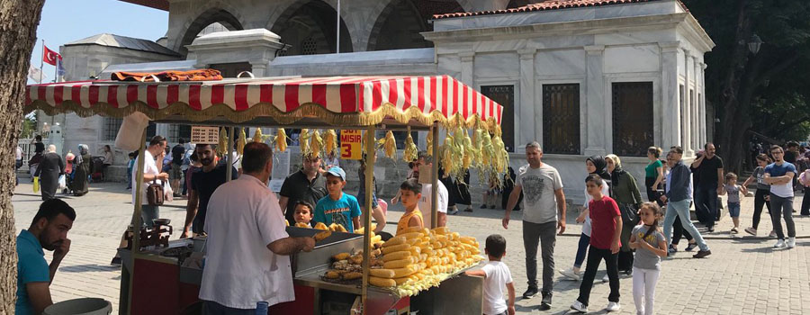 Roasted and boiled corn on the cob sold from an Istanbul street stall