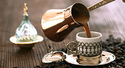 Cup of Turkish coffee served with Turkish delight